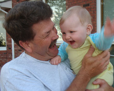Randy Carey with his granddaughter Leah